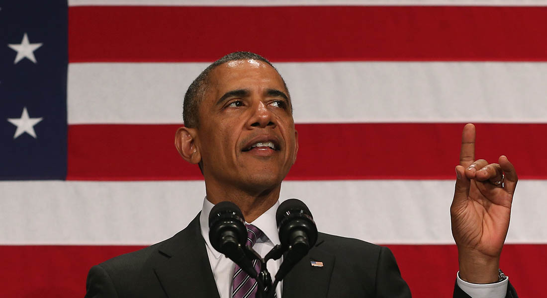 صحف: أوباما يهدي ميركل هاتفا وجوازات السفر السورية بالسوق السوداء