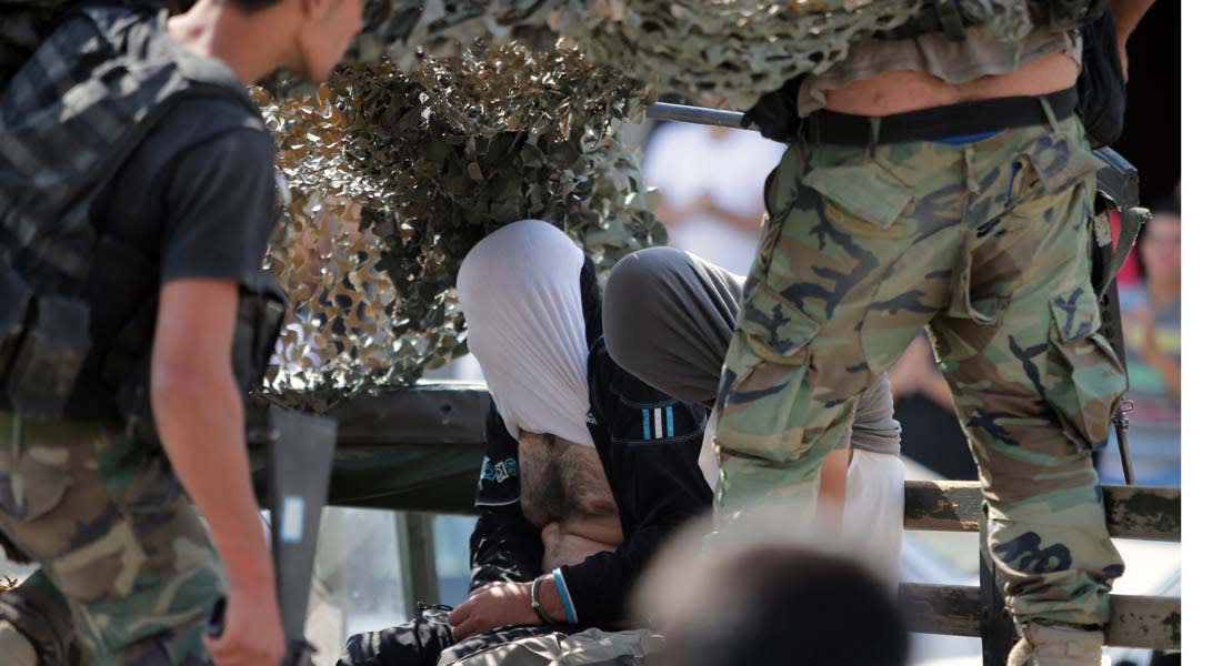 لبنان: "النصرة" تفرج عن رجلي أمن بوساطة "هيئة علماء المسلمين" والجيش يعتقل 12 مسلحاً سورياً