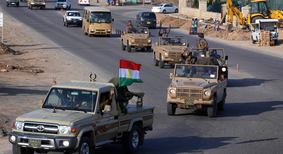 مقاتلون من البيشمرغة يغادرون شمال العراق في طريقهم إلى "كوباني" عبر تركيا