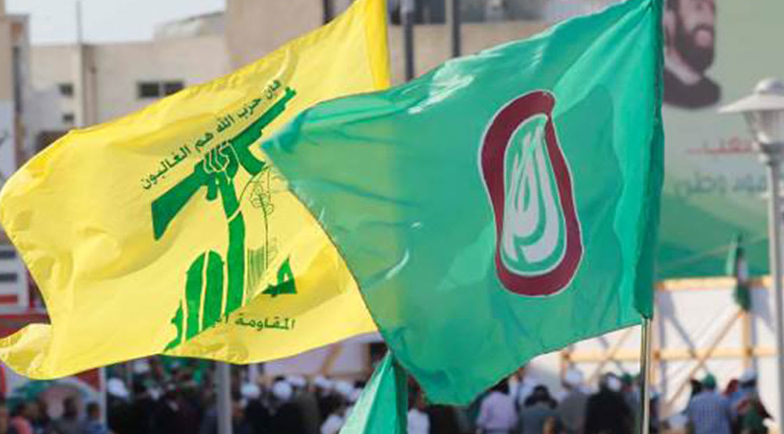 صورة ارشيفية لرايتي حزب الله وحركة أمل