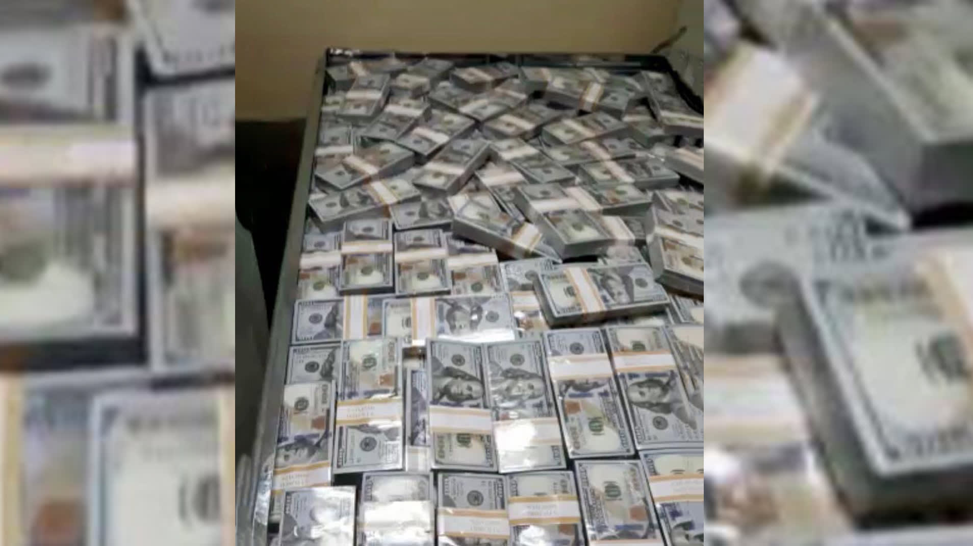 شرطة دبي تكشف حقيقة الفيديو المتداول لـ"صناديق الدولارات".. وتوجه تحذيرا 