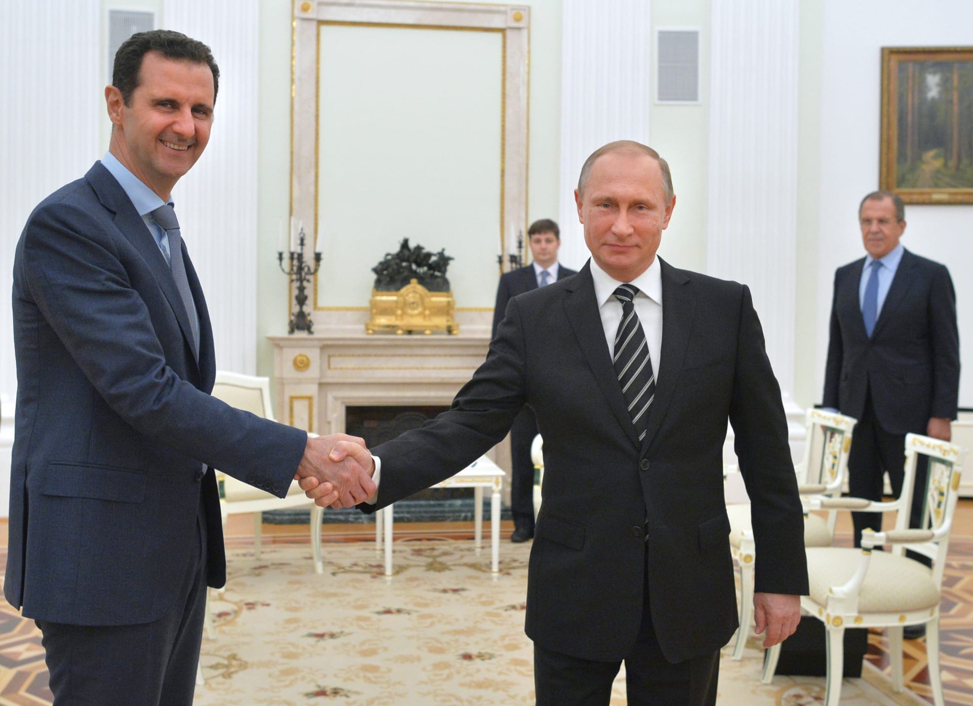 بوتين: الأسد منفتح على دعم جماعة معارضة مسلحة لمواجهة "داعش".. وشعبية الرئيس الروسي تصل "أعلى نسبة له في التاريخ"