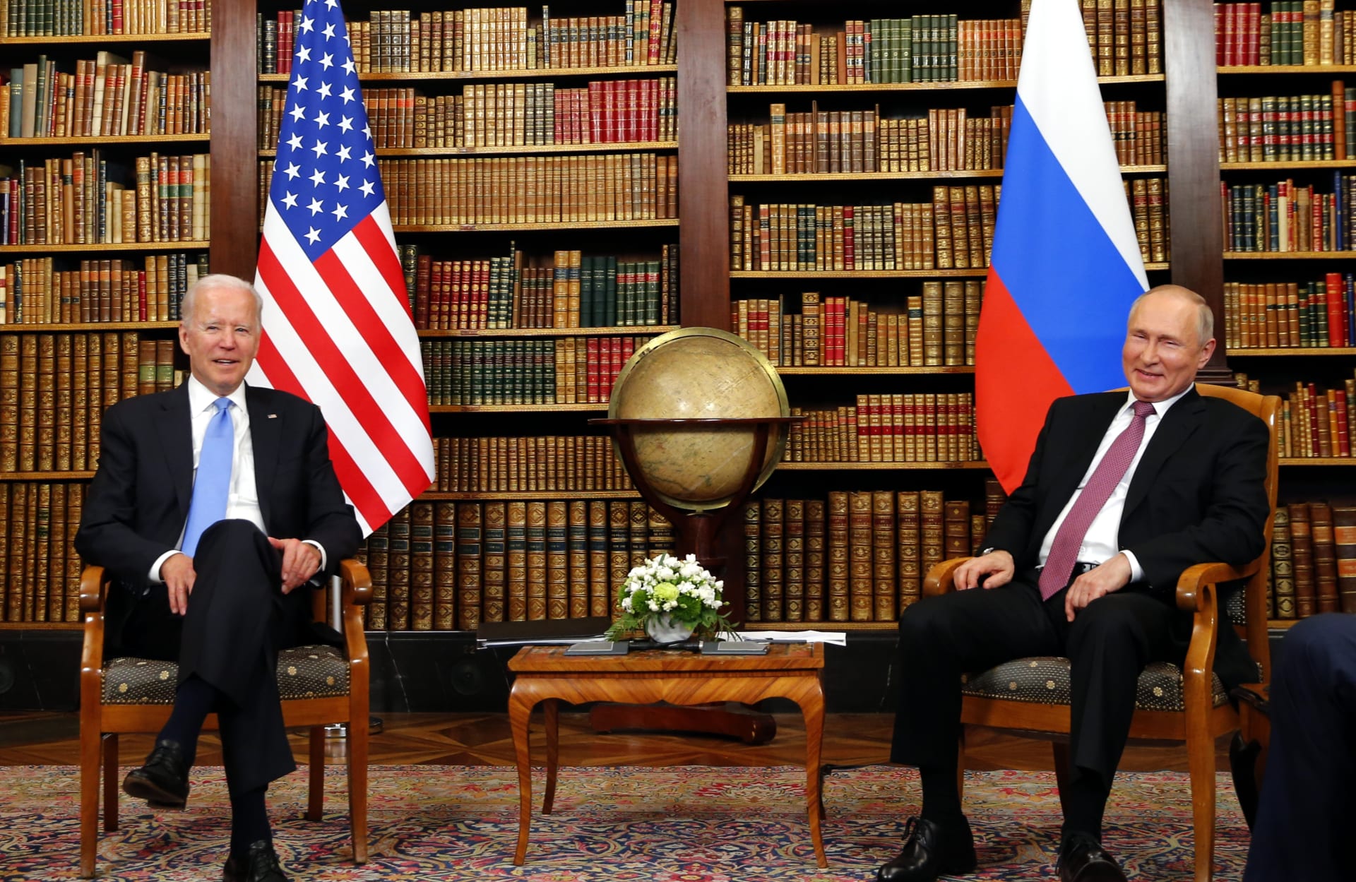 لقاء سابق بين فلاديمير بوتين وجو بايدن 