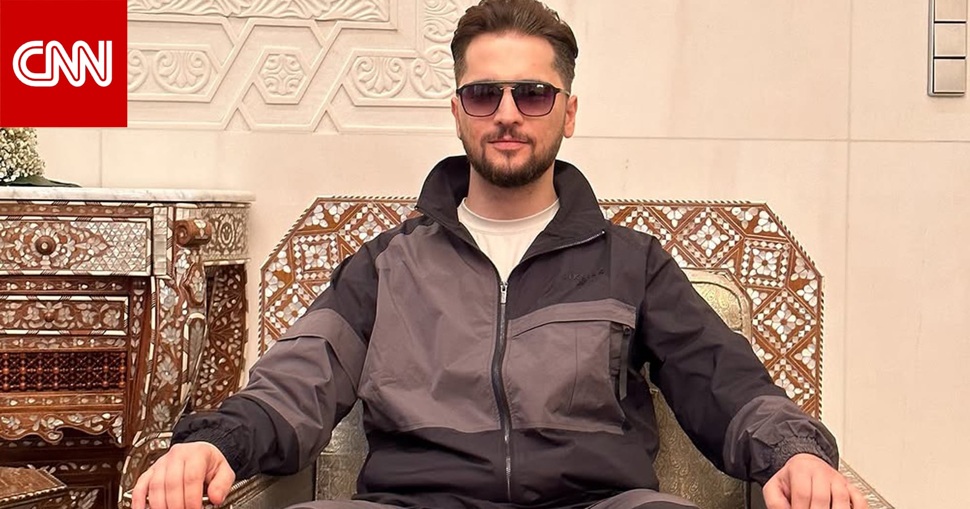جلس على كرسي الرئيس.. تيكتوكر سوري يثير الجدل بصورة له في القصر الرئاسي بدمشق