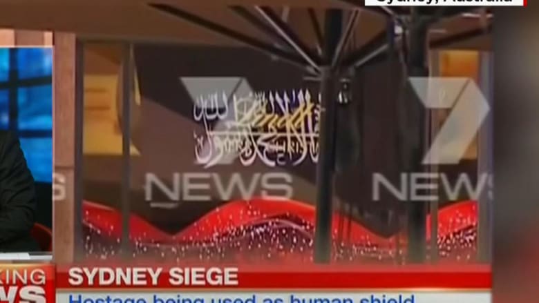 بالصور: لقطات من عملية اختطاف الرهائن في سيدني والاستنفار الأمني بالصور: لقطات من عملية اختطاف الرهائن في سيدني والاستنفار الأمني