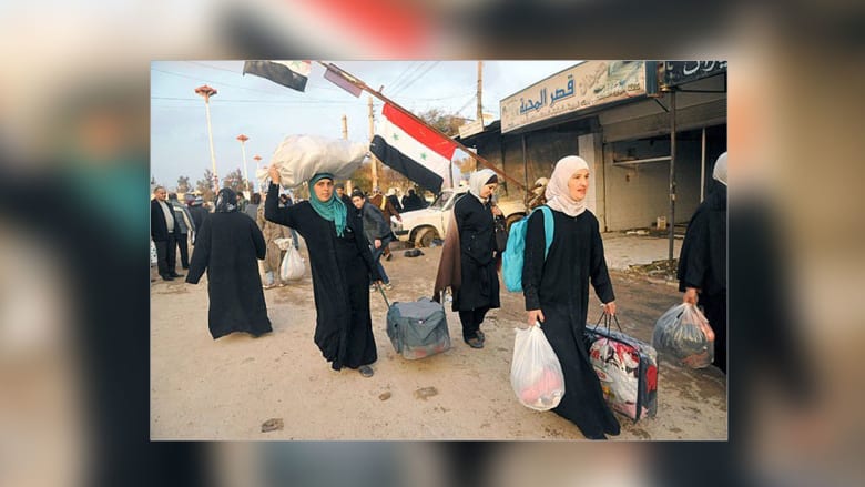 عائلات سورية تعود إلى معضمية الشام عائلات سورية تعود إلى معضمية الشام