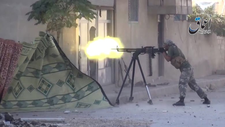 اشتباكات بشوارع كوباني بين مقاتلي داعش والأكراد والجيش السوري الحر