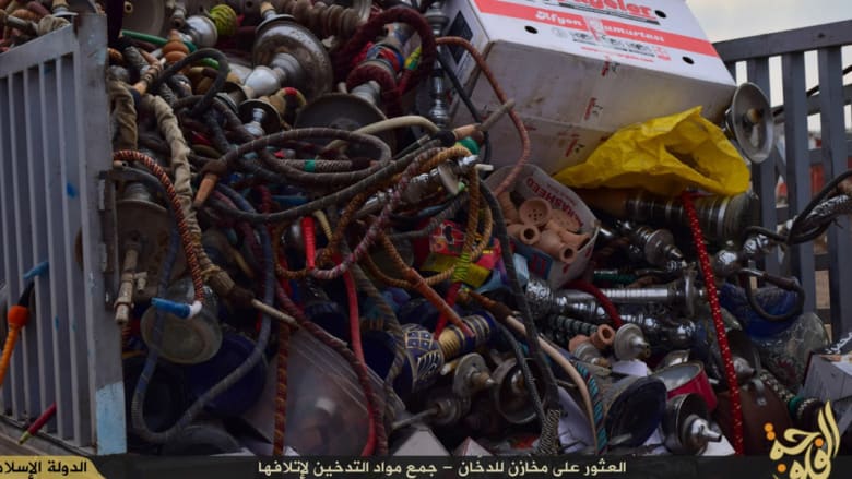 بالصور: عناصر داعش بالفلوجة يشنون حربا مدمرة.. ضحاياها علب السجائر والشيشة بالصور: عناصر داعش بالفلوجة يشنون حربا مدمرة.. ضحاياها علب السجائر والشيشة