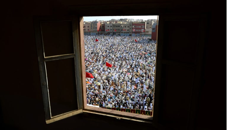 صلاة العيد في المغرب الذي أعلن السبت أول أيام عيد الفطر، 18 يوليو/ تموز 2015 صلاة العيد في المغرب الذي أعلن السبت أول أيام عيد الفطر، 18 يوليو/ تموز 2015