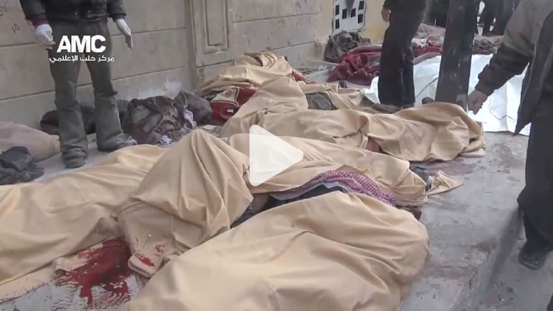 جثث تملأ شوارع حلب إثر القصف جثث تملأ شوارع حلب إثر القصف