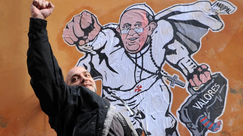 البابا "سوبرمان" يحلق على جدران شوارع روما