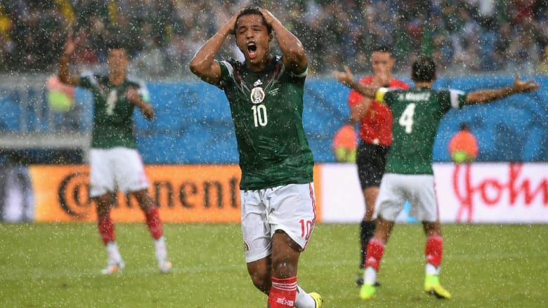 المكسيك والكاميرون بكأس العالم بالصور