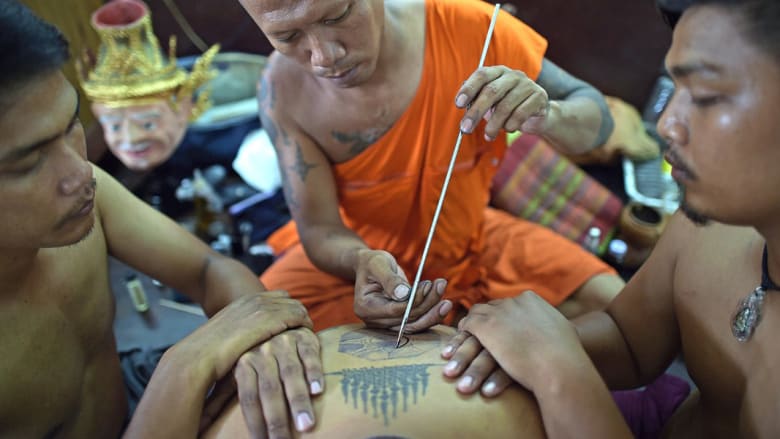 بالصور..أبرز الوشوم البوذية لجلب الحظ والحماية من الأذى