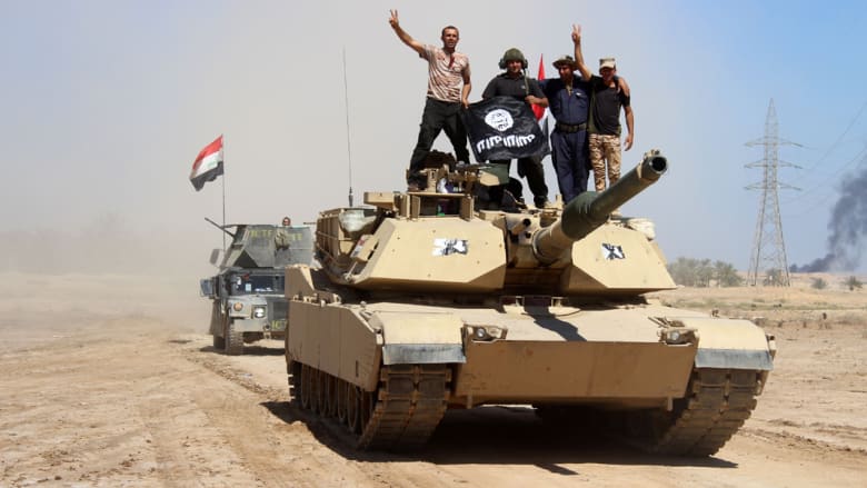 كارتر في بغداد بزيارة مفاجئة.. وفرقة مدرعة عراقية تتقدم لقراقوش
