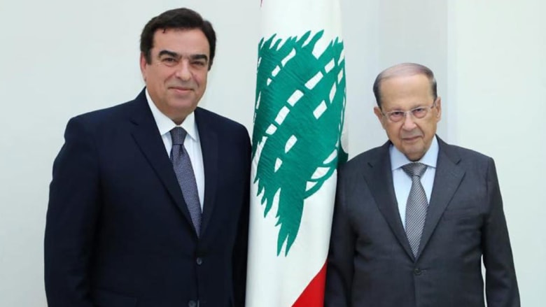 صورة أرشيفية لجورح قرداحي (يسار) والرئيس اللبناني، ميشال عون 