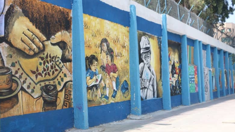 جداريات فنية تظهر الجانب الجميل بغزة بعيداً عن المعاناة