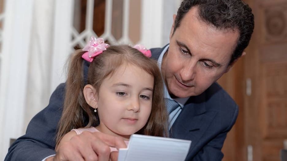هكذا كانت زيارة الأسد وزوجته إلى عائلات روس قتلوا بسوريا