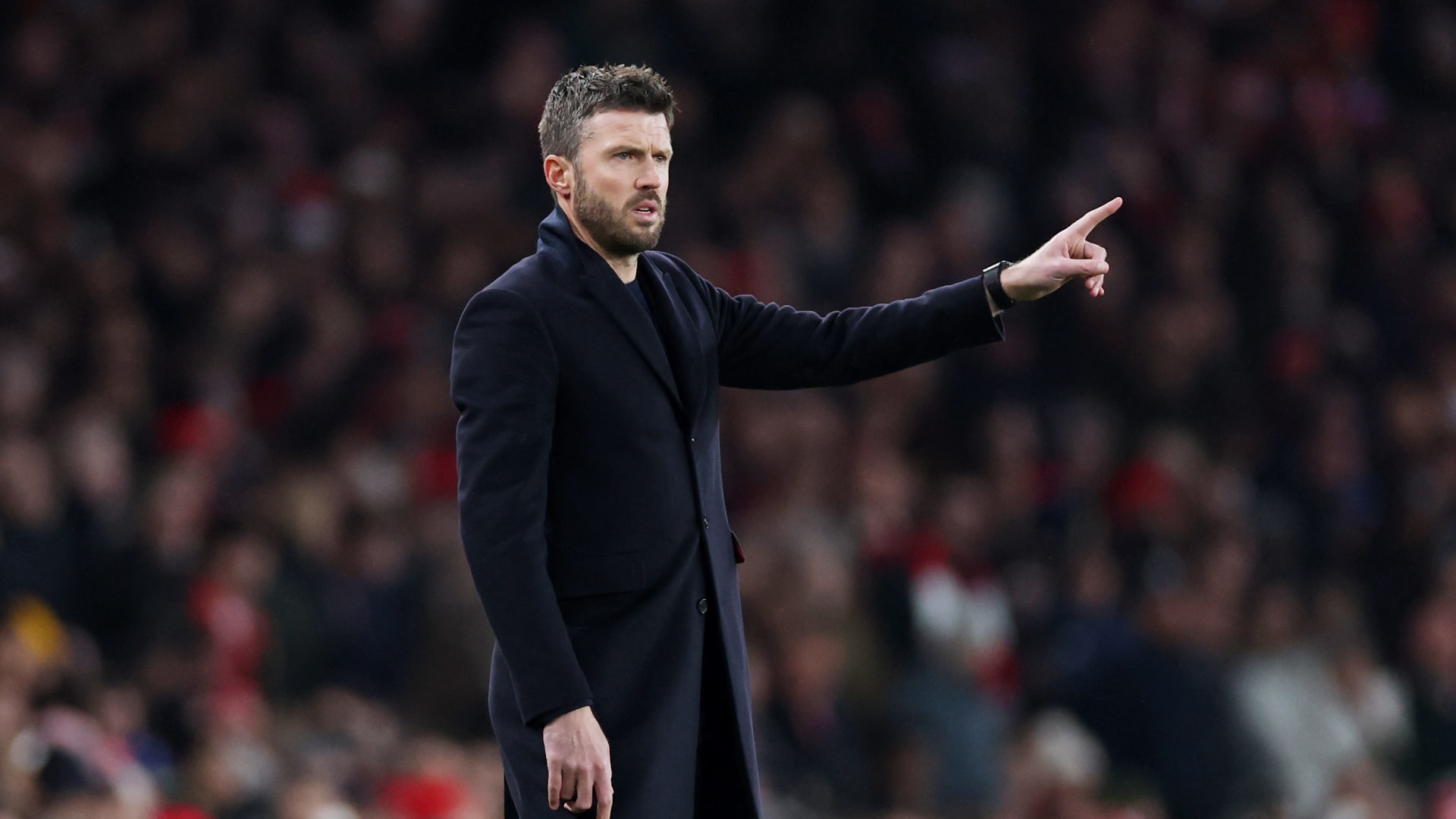 ما الرقم القياسي الذي حققه مايكل كاريك في أول مباراتين مع مانشستر يونايتد؟